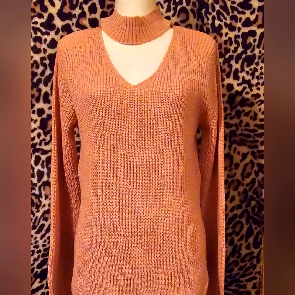 Pink knit cutout sweater, size L
